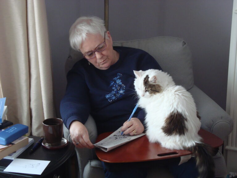 MW writing with cat, 2016